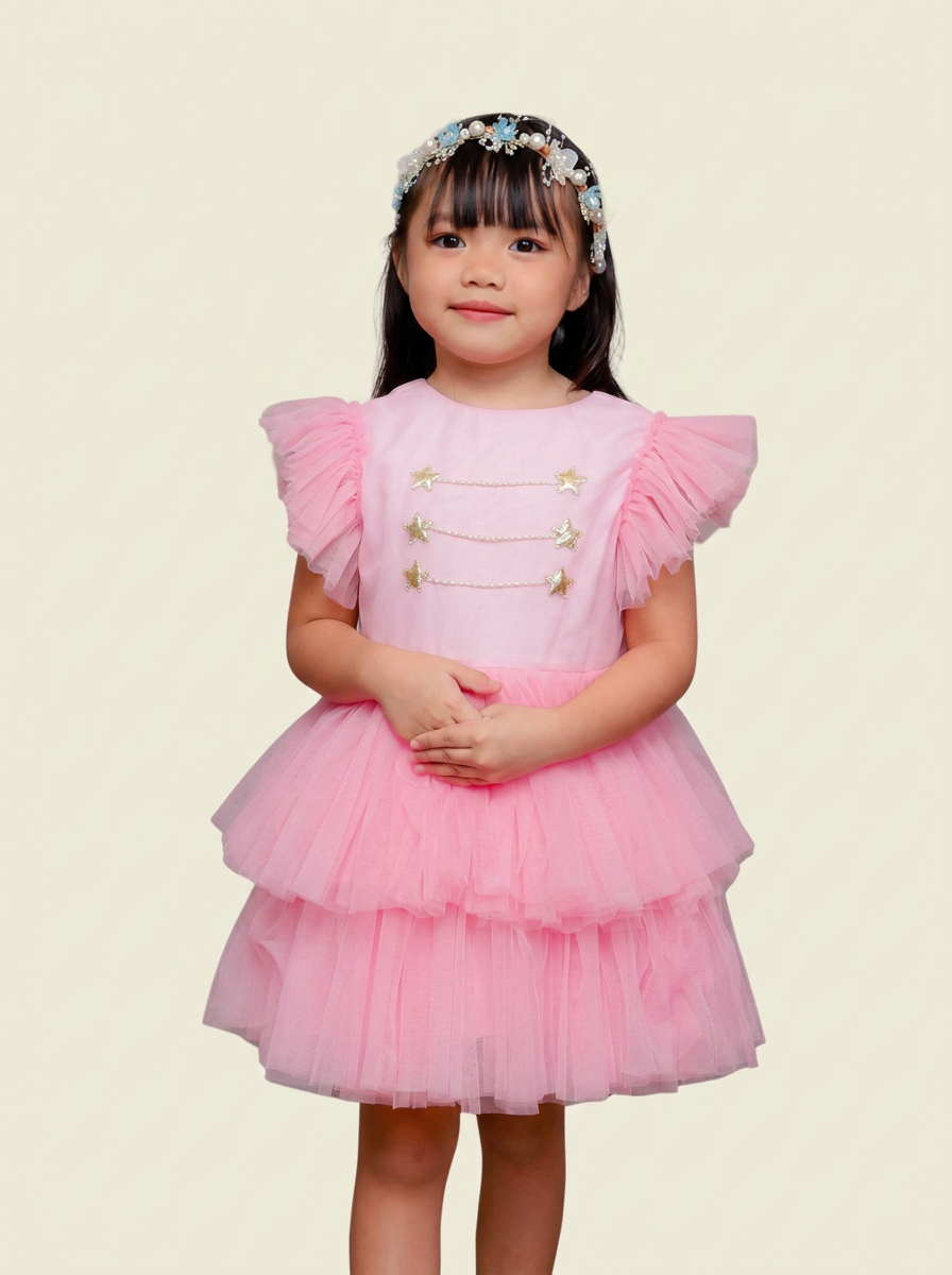 Kendra wearing the Sweet Little Things pink nutcracker dress
